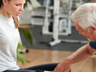 Woman with joint pain in gym